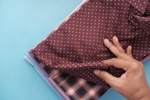 Close up of stack of cloths on table