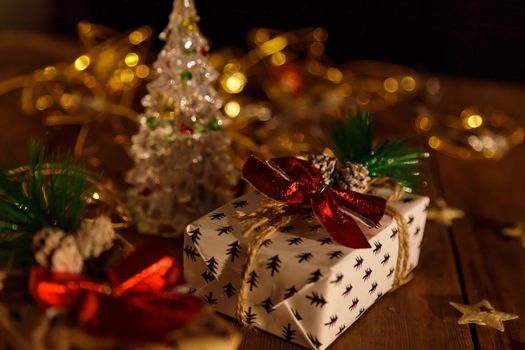 Christmas New Year's boxes with gifts. Yellow garland and decorative stars.