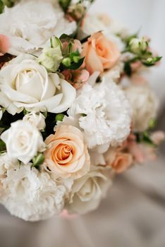 elegant wedding bouquet of fresh natural flowers and greenery