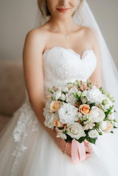 elegant wedding bouquet of fresh natural flowers and greenery