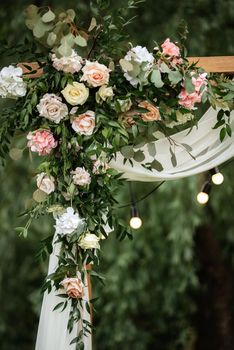 wedding ceremony area with dried flowers in a meadow in a pine brown forest