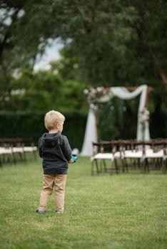 wedding ceremony area with dried flowers in a meadow in a pine brown forest