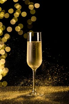champagne glass with bokeh lights. High resolution photo