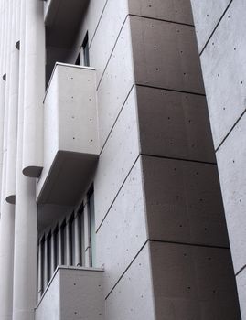 angles corners and geometric shapes on the exterior wall of a 1960s concrete brutalist building