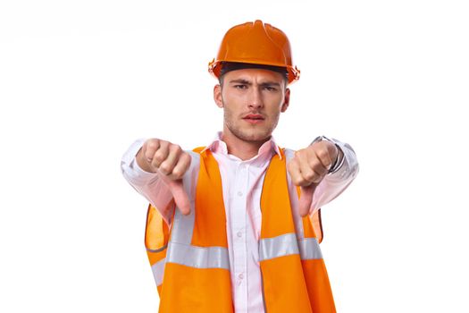 man in working orange uniform construction work. High quality photo