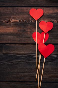 Valentine's day hearts on wooden background decoration object. High quality photo