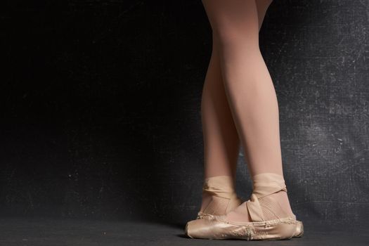 feet in ballet flats performing ballerina traditional dance. High quality photo