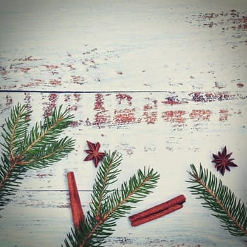 Christmas composition. Beautiful holiday decorations on a white wooden background. Flat lay, top view with copy space.