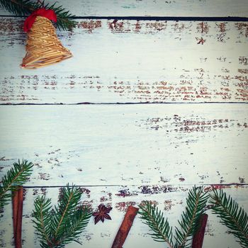 Christmas background. Beautiful decorations for the Christmas tree on a wooden white background. Concept for holidays and winter time with copy space.