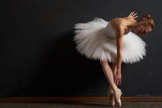ballerina dance performance classic dark background tradition. High quality photo