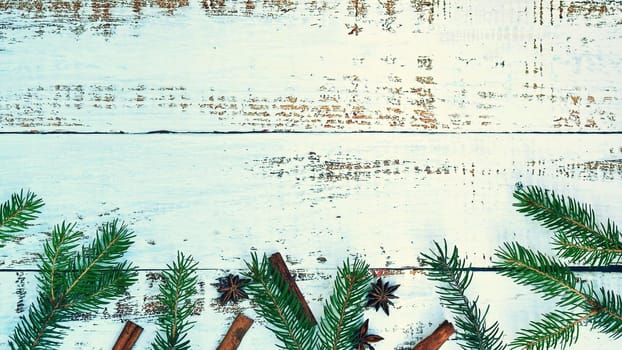 Christmas composition. Beautiful holiday decorations on a white wooden background. Flat lay, top view with copy space.