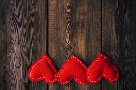 Valentine's day hearts on wooden background decoration object. High quality photo