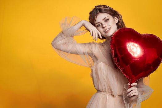 beautiful woman heart balloon holiday Valentine's Day model studio. High quality photo