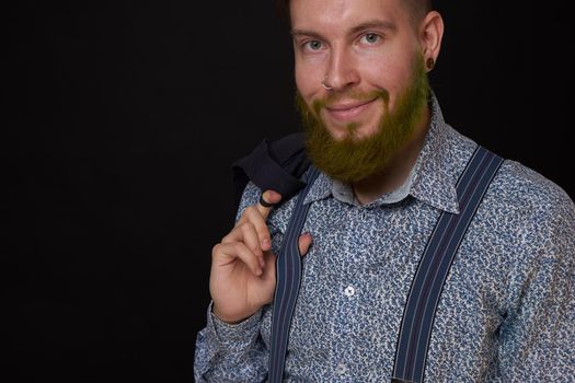 business man in shirt with jacket over his shoulders posing self confidence. High quality photo