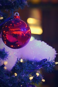 Christmas and New Year holidays background, winter season. Christmas greeting card with ornaments and lights for tree.