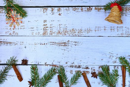 Christmas background. Beautiful decorations for the Christmas tree on a wooden white background. Concept for holidays and winter time with copy space.