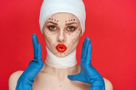 a person Red lips plastic surgery operation bare shoulders red background. High quality photo