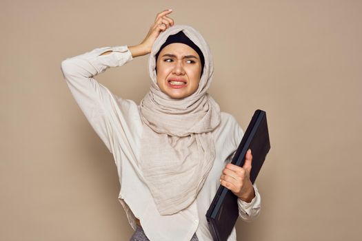 muslim woman with laptop work learning technology. High quality photo