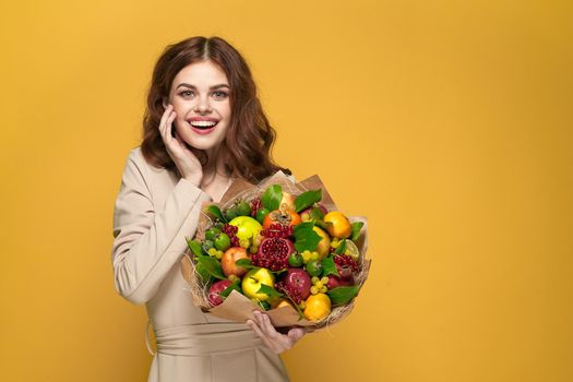 cheerful woman fashionable hairstyle bouquet of flowers decoration colorful background. High quality photo