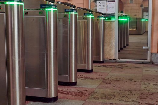 Saint Petersburg, Russia - January 09, 2021: Automatic turnstile with sliding doors to control the flow of people