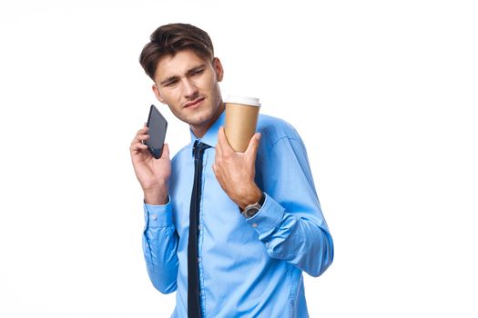 man in shirt with tie coffee cup posing office studio lifestyle. High quality photo