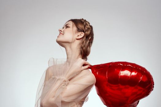 pretty woman heart balloon posing romance holiday. High quality photo