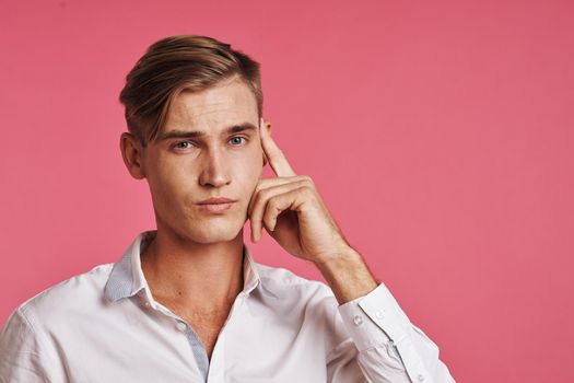 handsome man posing white shirt fashion self confidence studio lifestyle. High quality photo