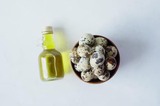 close up of Quails eggs in a box .