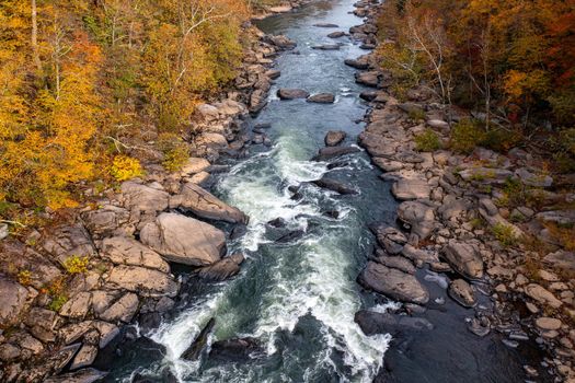 Valley Falls State Park near Fairmont in West Virginia on a colorful misty autumn day with fall colors on the trees