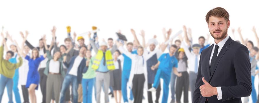 Businessman with thumb up in front of crowd of different industries professions people cooperation job search staff management concept