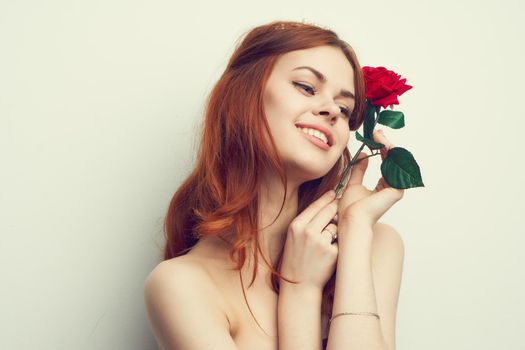 attractive woman with rose flower makeup romance model. High quality photo