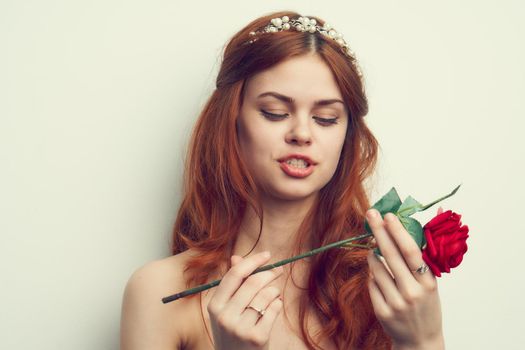 attractive woman with rose flower makeup romance model. High quality photo