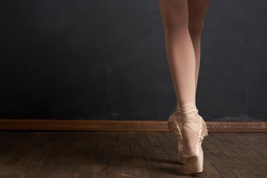 ballerina legs exercise performance classical style close-up. High quality photo