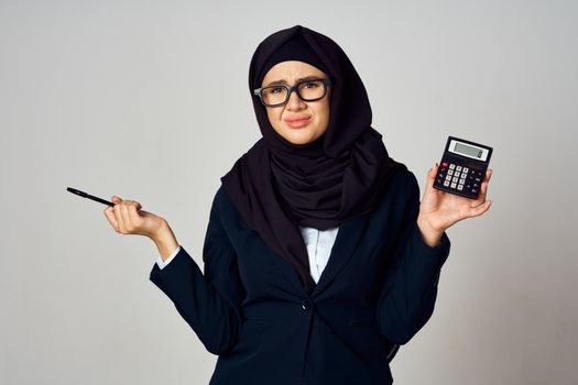 woman in black hijab laptop work technology office. High quality photo