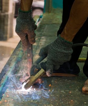 Iron workers in the factory.