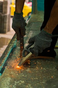 Iron workers in the factory.