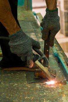 Iron workers in the factory.