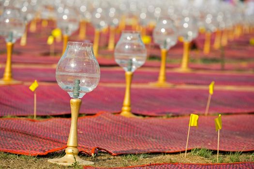 Glass candle holder for candles in Buddhism