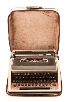 Old typewriter on white background