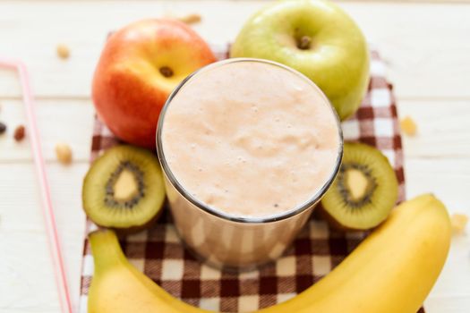 fresh fruit cocktail breakfast dessert organic wood background. High quality photo