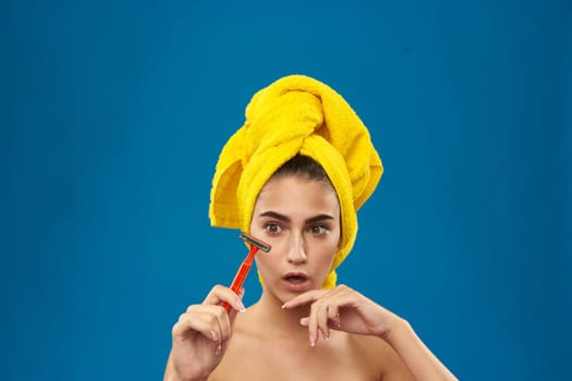 cheerful woman razor in hand skin care hygiene Lifestyle. High quality photo