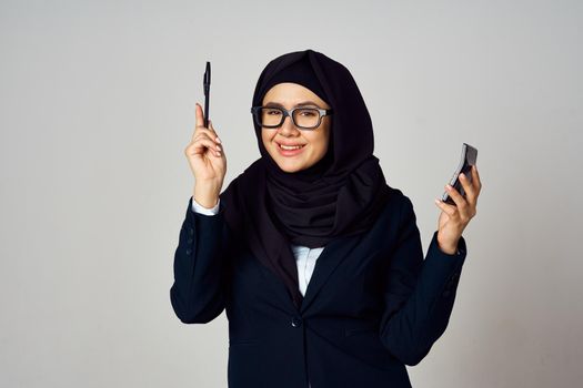 woman in black hijab laptop work technology office. High quality photo