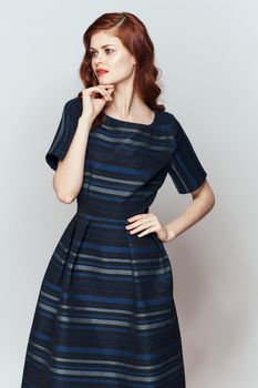 red-haired woman fun dresses posing lifestyle. High quality photo