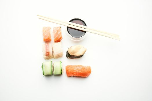 sushi chopsticks soy sauce snack delicacy japanese cuisine. High quality photo