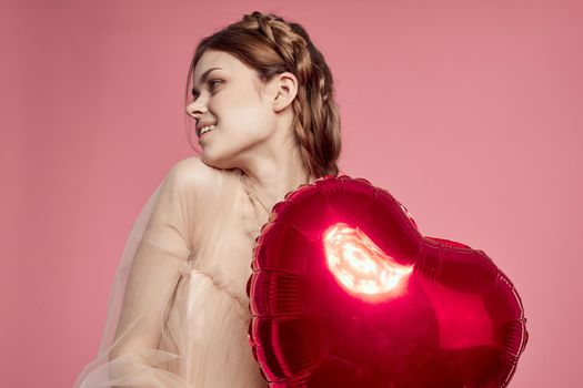 smiling woman heart in hands gift love romance. High quality photo