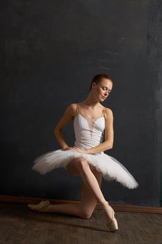 woman ballerina in white tutu performance grace dance. High quality photo