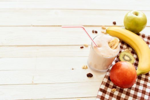 fresh fruit cocktail breakfast dessert organic wood background. High quality photo