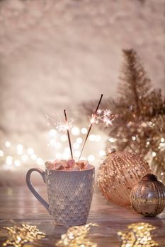 Cozy winter composition with a cup and Hot chocolate with marshmallow.