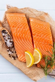 Fresh salmon steak with spinach and lentils.