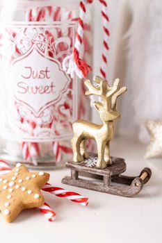 Christmas Santa Claus Hat Hanging On Wood chair, Xmas Concept, Decoration Over Grunge Wooden Background.